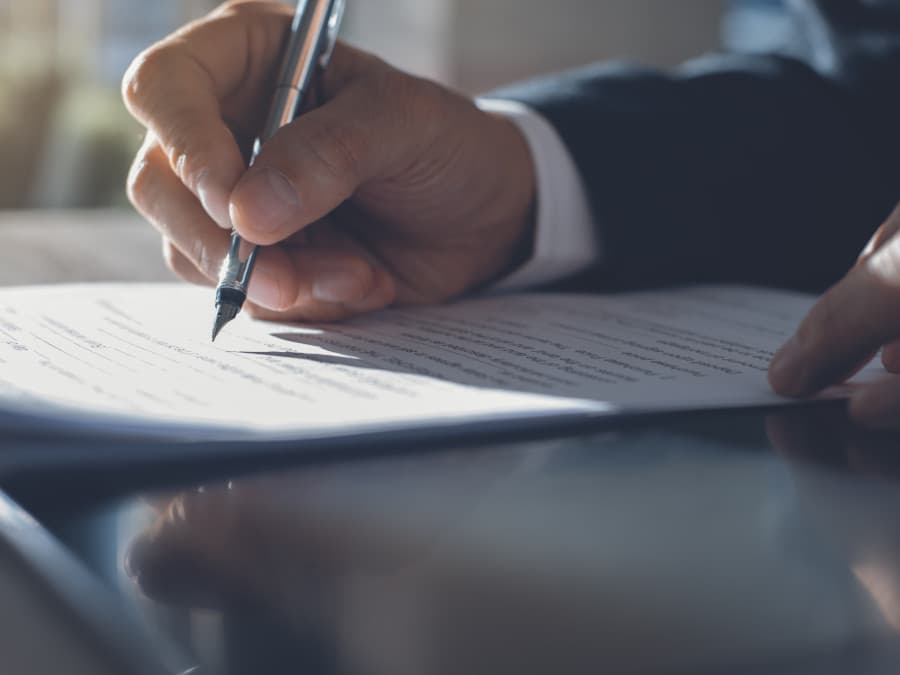 Solicitor Signing A Document